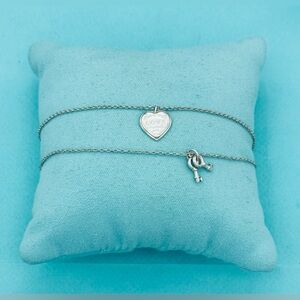 Tiffany & Co SS RTL Return to Love Double Strand Mini Heart Lock & Key Bracelet